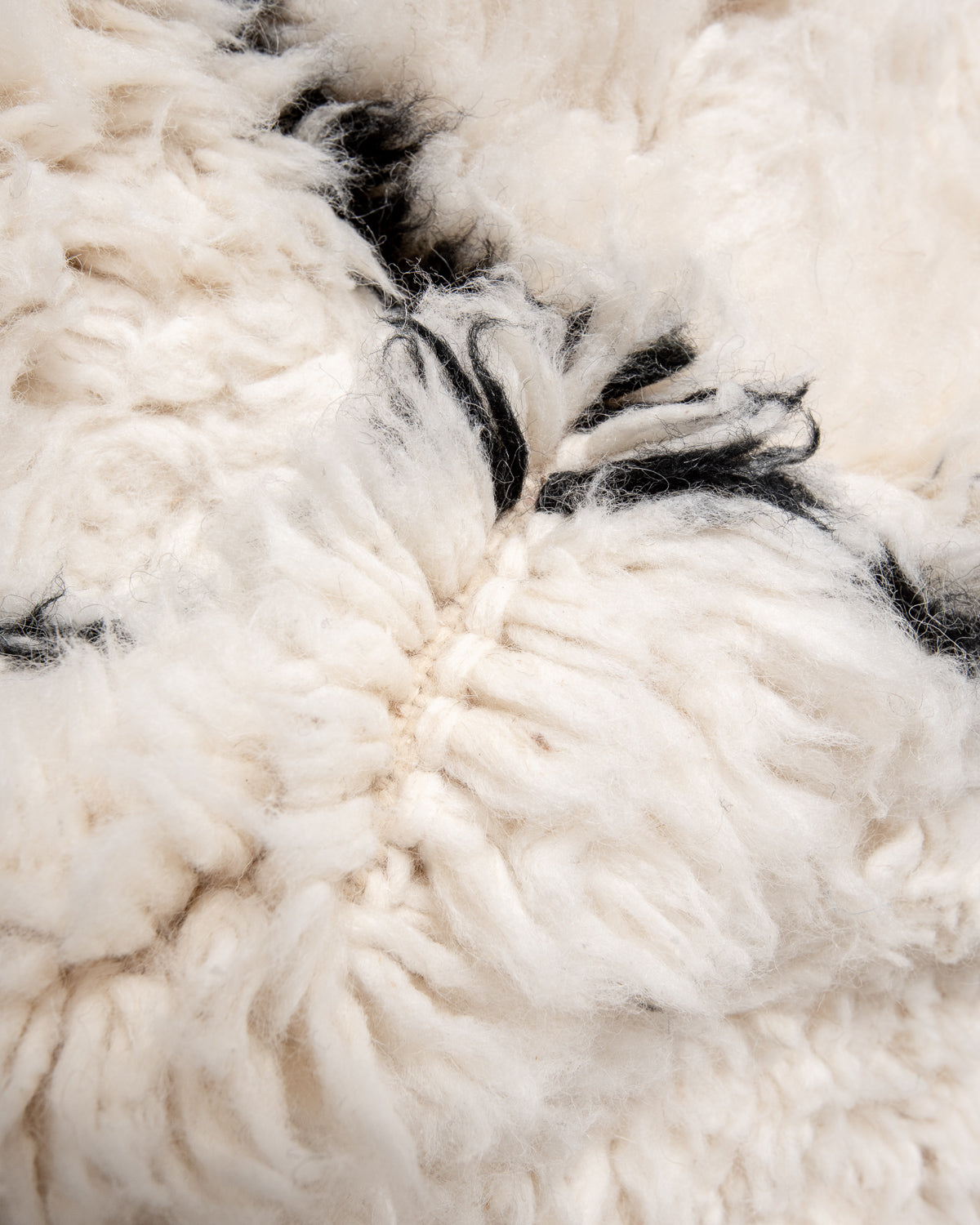 Modern, designer, handcrafted Berber rug from Morocco. Beniourain carpet with minimalist design, natural wool pile and a fluffy texture.